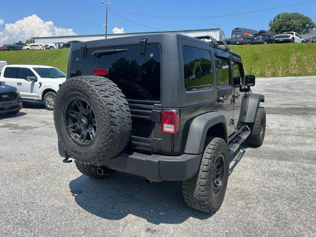 used 2015 Jeep Wrangler Unlimited car, priced at $15,997