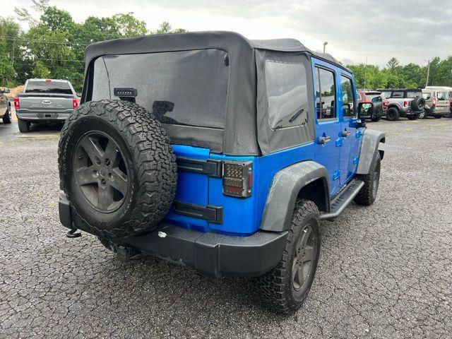 used 2015 Jeep Wrangler Unlimited car, priced at $19,818