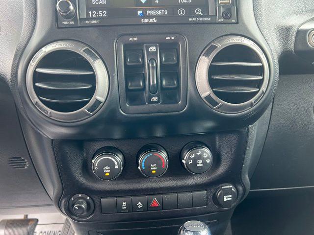 used 2015 Jeep Wrangler Unlimited car, priced at $19,818