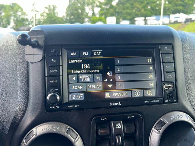 used 2015 Jeep Wrangler Unlimited car, priced at $19,250