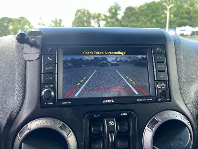 used 2015 Jeep Wrangler Unlimited car, priced at $19,250