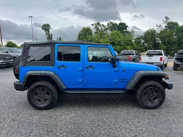 used 2015 Jeep Wrangler Unlimited car, priced at $19,818