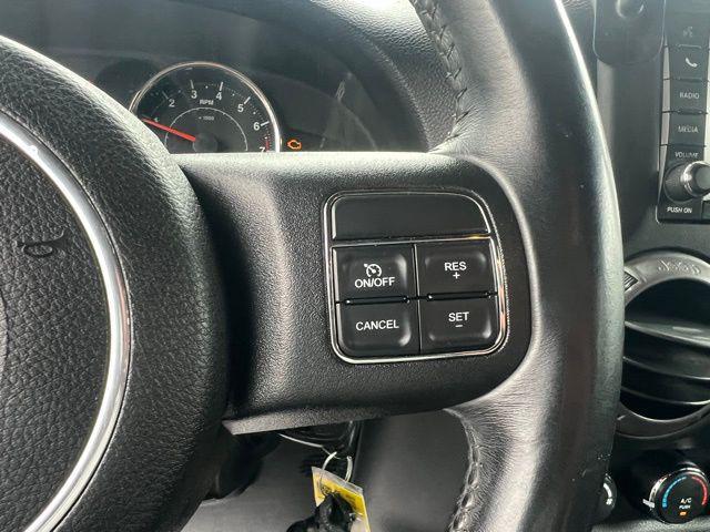 used 2015 Jeep Wrangler Unlimited car, priced at $19,818