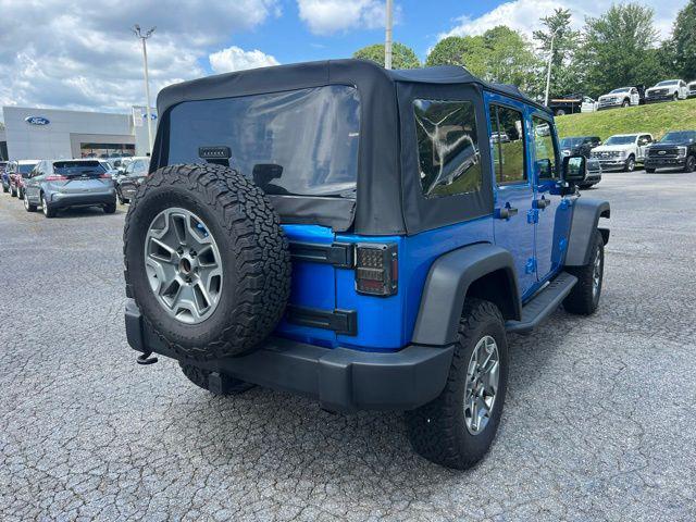 used 2015 Jeep Wrangler Unlimited car, priced at $19,250