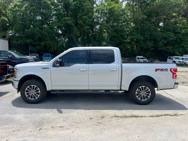 used 2018 Ford F-150 car, priced at $23,853