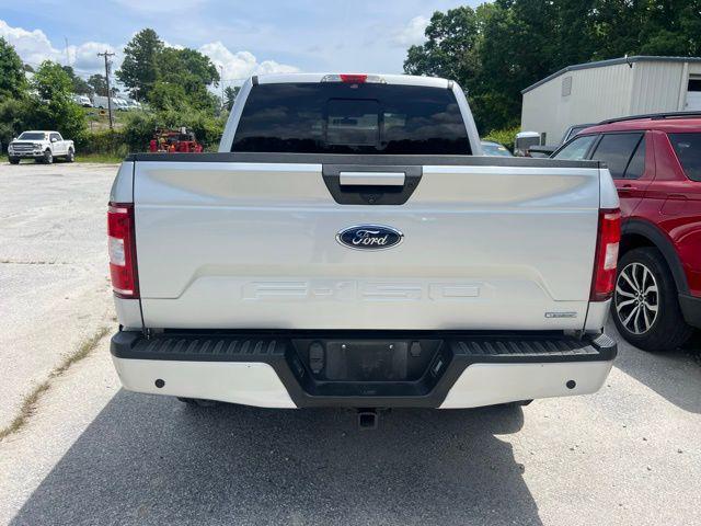 used 2018 Ford F-150 car, priced at $23,853