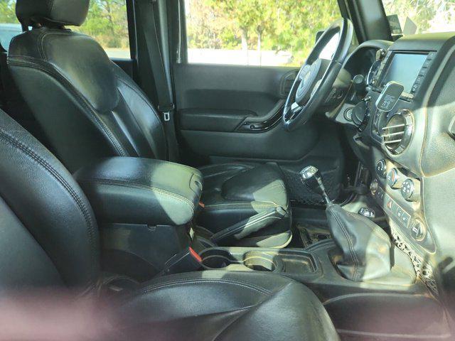 used 2015 Jeep Wrangler Unlimited car, priced at $15,242