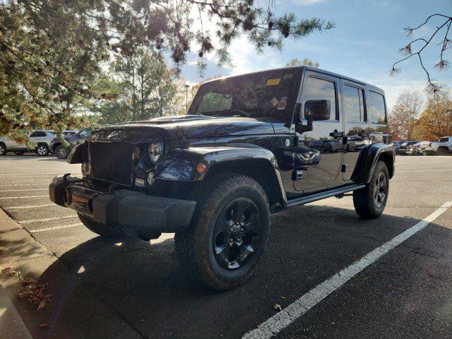 used 2015 Jeep Wrangler Unlimited car, priced at $15,242