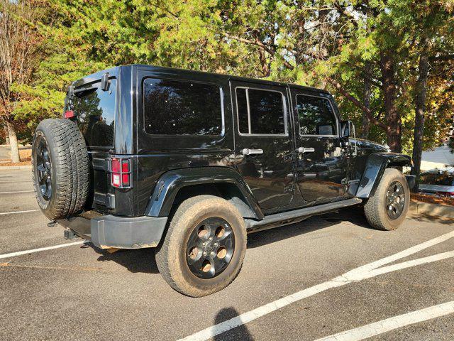 used 2015 Jeep Wrangler Unlimited car, priced at $15,242