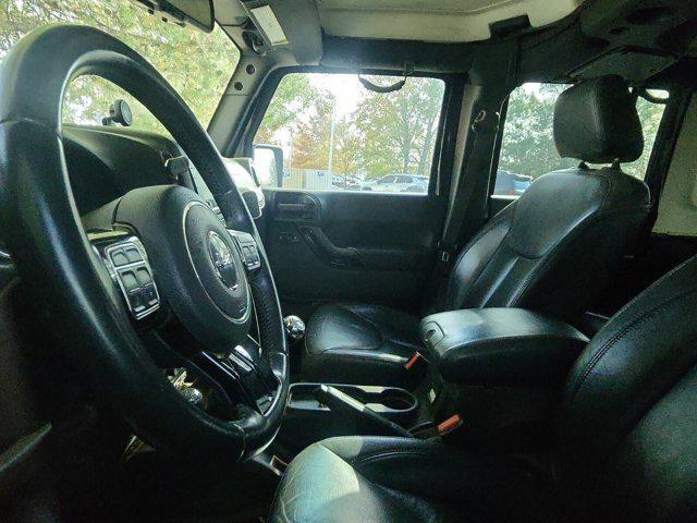used 2015 Jeep Wrangler Unlimited car, priced at $15,242