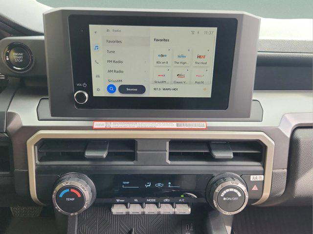 used 2025 Toyota Tacoma car, priced at $34,538