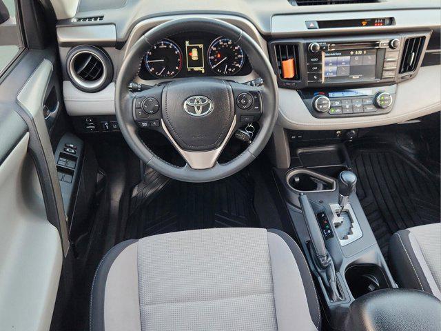 used 2018 Toyota RAV4 car, priced at $19,204