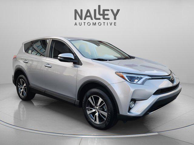 used 2018 Toyota RAV4 car, priced at $19,204