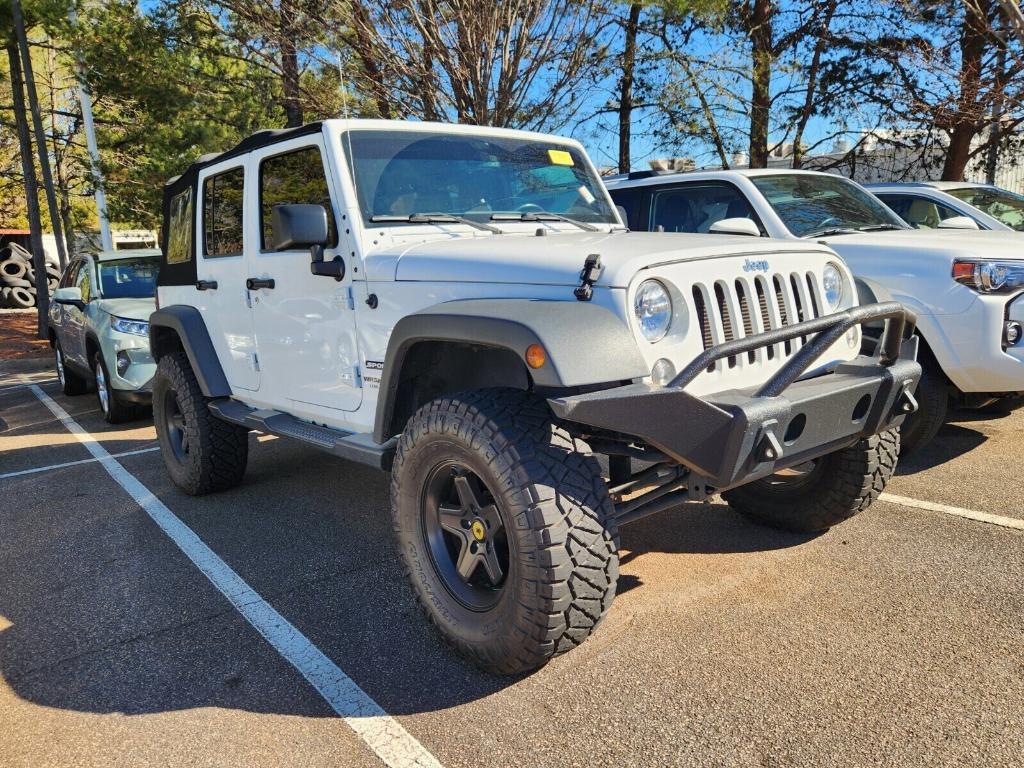 used 2015 Jeep Wrangler Unlimited car, priced at $21,526