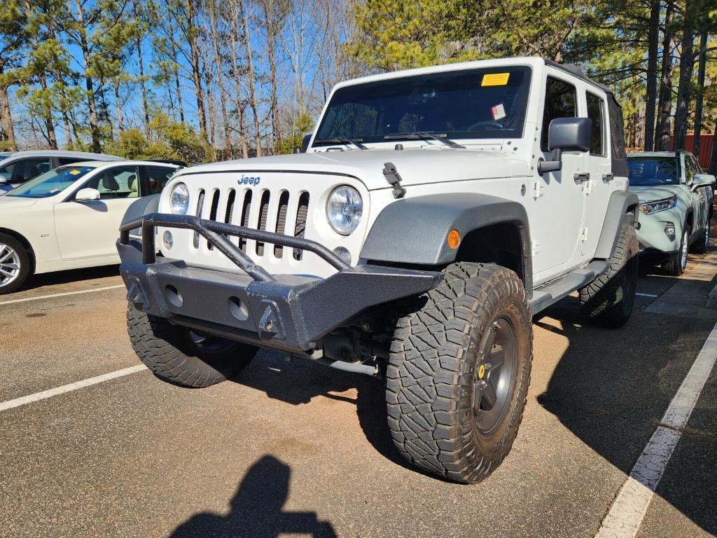 used 2015 Jeep Wrangler Unlimited car, priced at $21,526