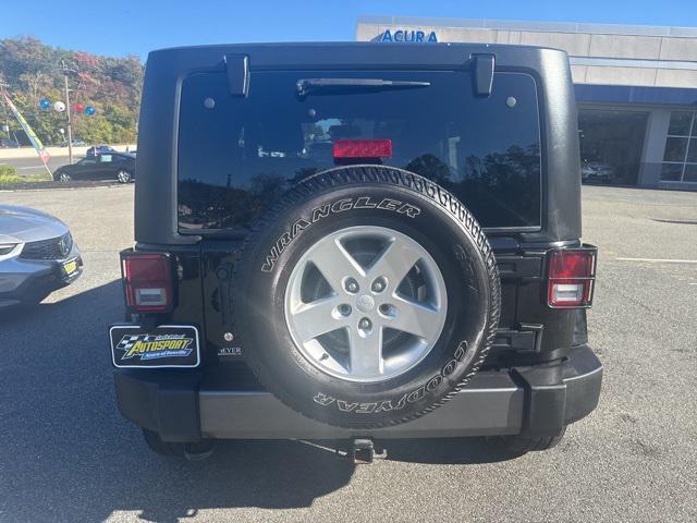 used 2014 Jeep Wrangler car, priced at $16,595