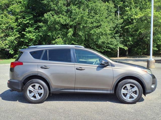 used 2015 Toyota RAV4 car, priced at $15,299