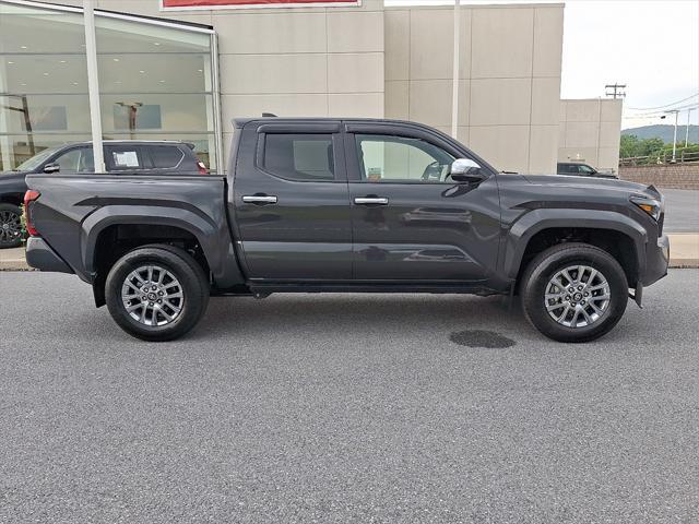 used 2024 Toyota Tacoma car, priced at $49,571