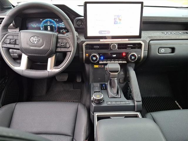 used 2024 Toyota Tacoma car, priced at $49,571