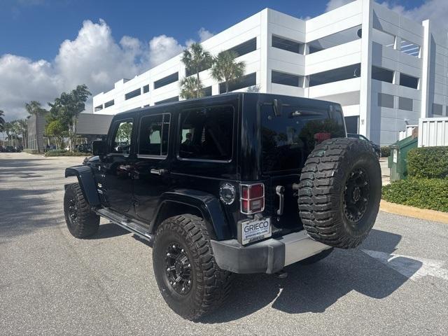 used 2014 Jeep Wrangler Unlimited car, priced at $26,991