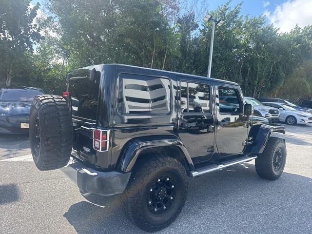 used 2014 Jeep Wrangler Unlimited car, priced at $26,991