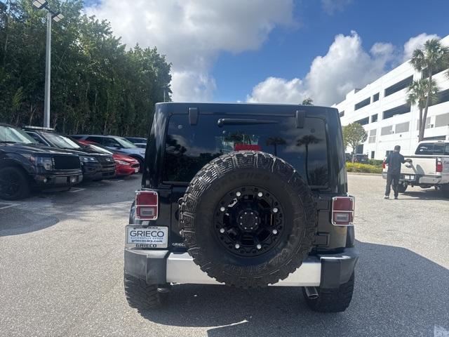 used 2014 Jeep Wrangler Unlimited car, priced at $26,991