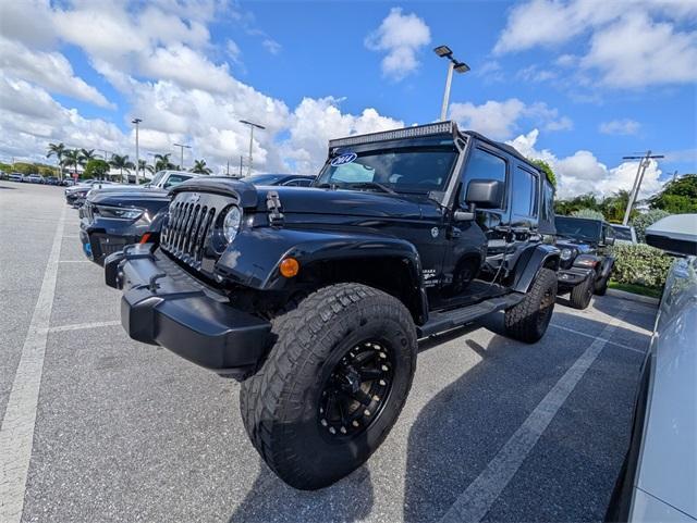 used 2014 Jeep Wrangler Unlimited car, priced at $16,400