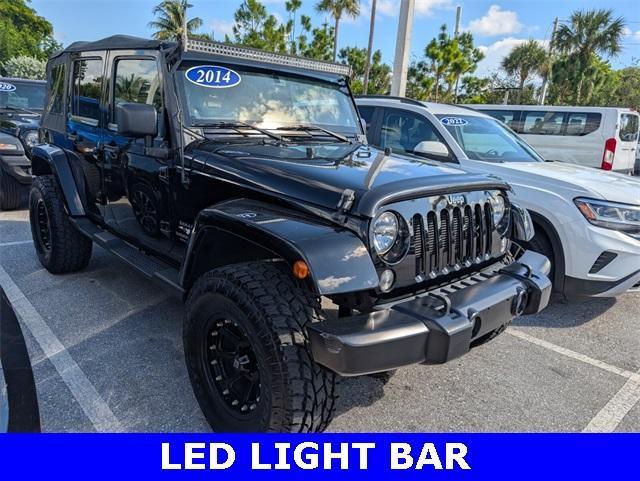 used 2014 Jeep Wrangler Unlimited car, priced at $16,400