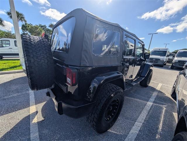 used 2014 Jeep Wrangler Unlimited car, priced at $16,400