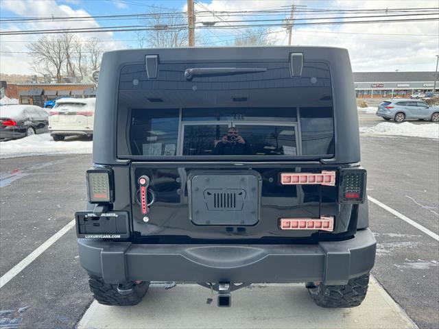 used 2016 Jeep Wrangler Unlimited car, priced at $17,900