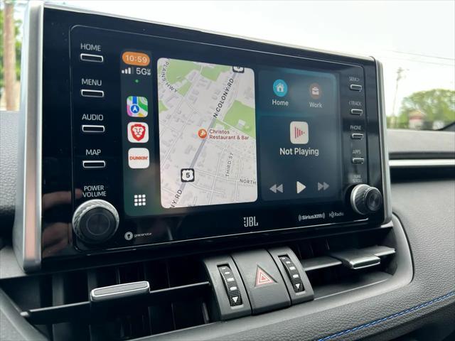 used 2021 Toyota RAV4 Hybrid car, priced at $30,900