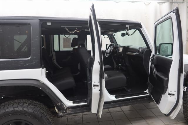 used 2016 Jeep Wrangler Unlimited car, priced at $20,617