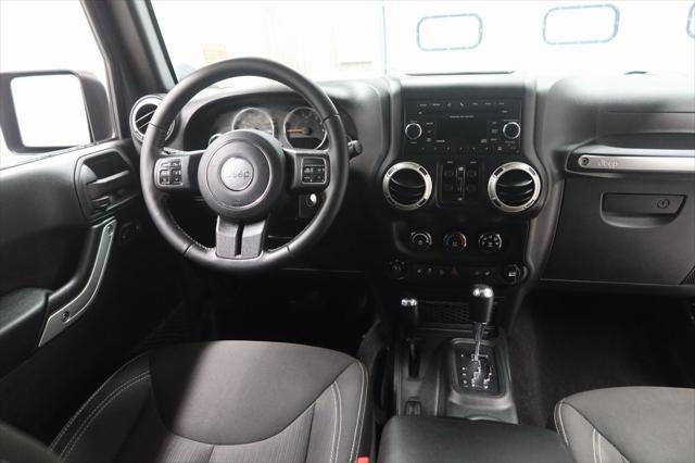 used 2016 Jeep Wrangler Unlimited car, priced at $24,642