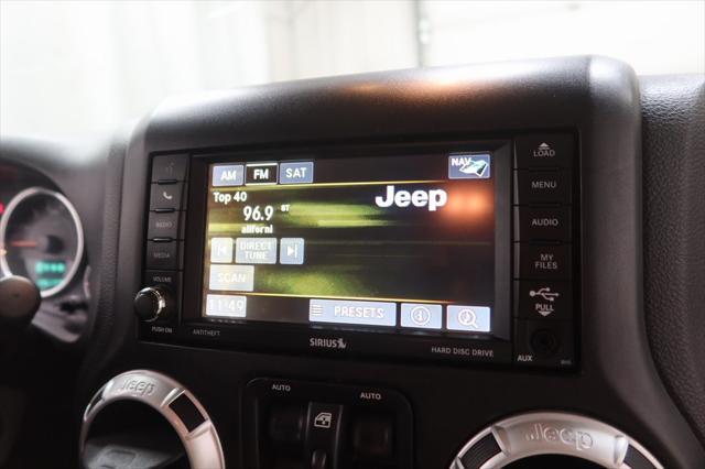 used 2015 Jeep Wrangler Unlimited car, priced at $19,937