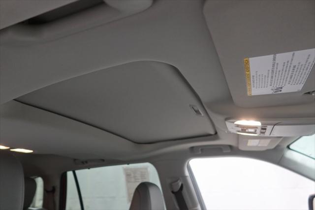 used 2021 Toyota Highlander Hybrid car, priced at $35,228