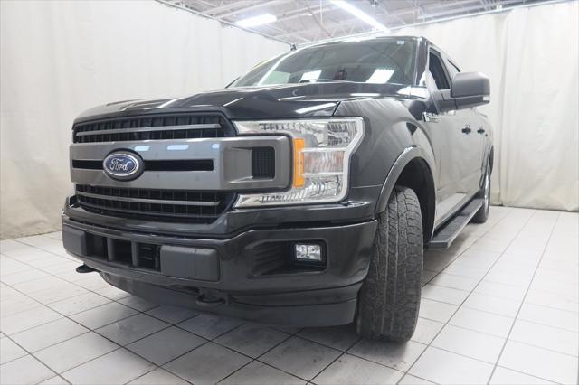 used 2018 Ford F-150 car, priced at $23,194