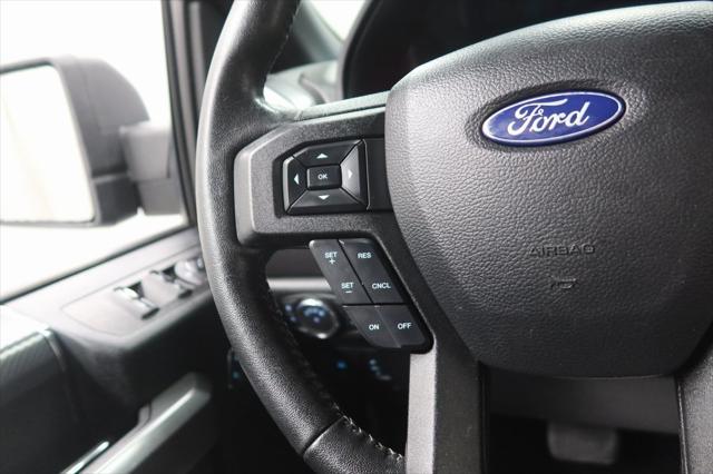 used 2018 Ford F-150 car, priced at $23,194