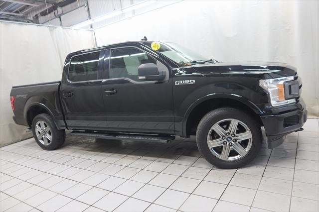used 2018 Ford F-150 car, priced at $23,194