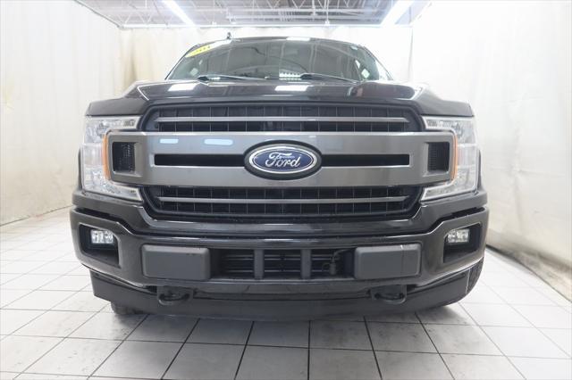 used 2018 Ford F-150 car, priced at $23,194