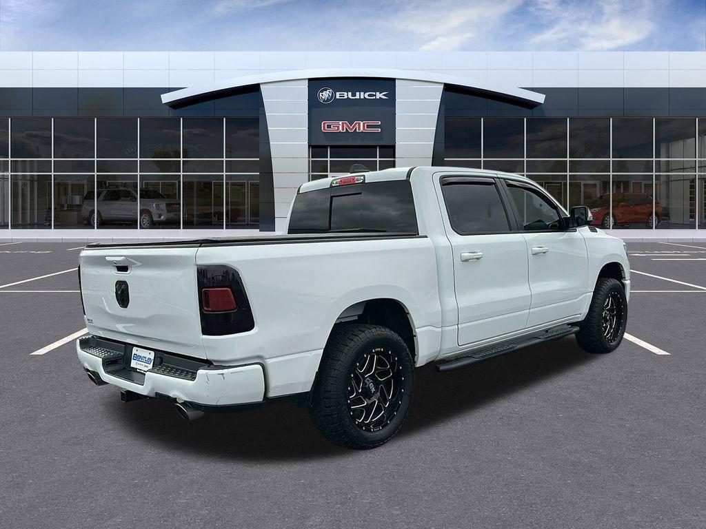 used 2019 Ram 1500 car, priced at $27,878