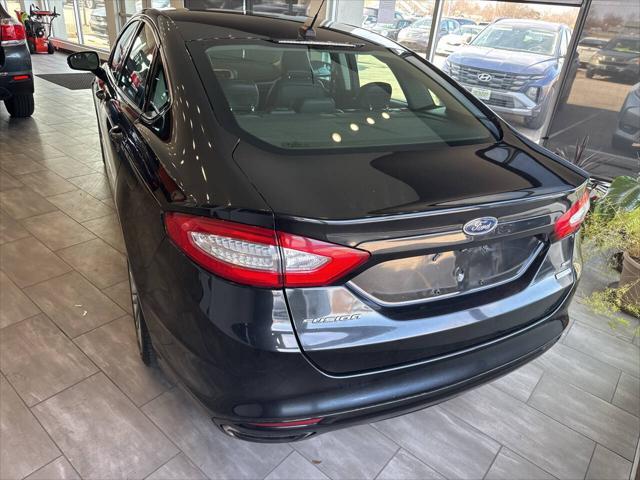 used 2015 Ford Fusion car, priced at $7,990