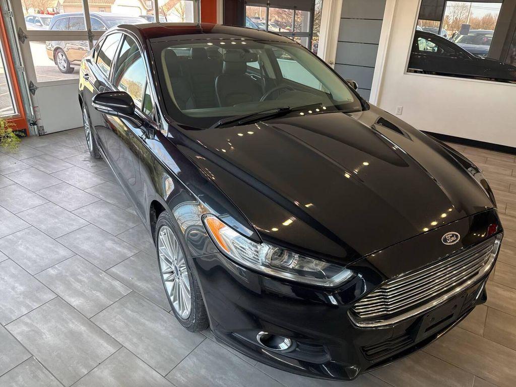 used 2015 Ford Fusion car, priced at $6,990