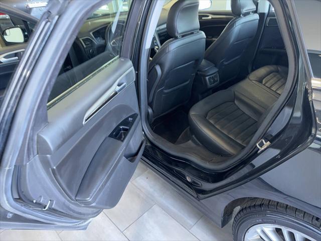 used 2015 Ford Fusion car, priced at $7,990