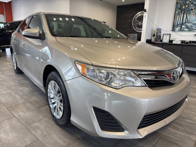 used 2014 Toyota Camry car, priced at $13,990