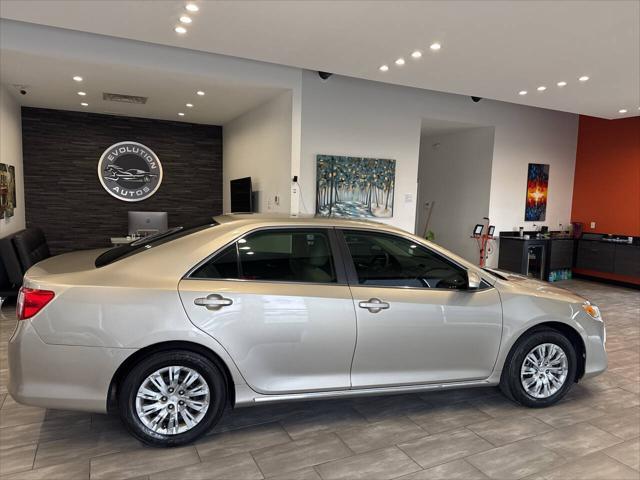 used 2014 Toyota Camry car, priced at $13,990