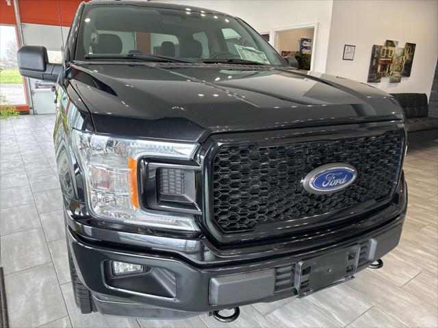 used 2018 Ford F-150 car, priced at $23,490