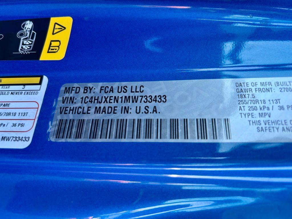 used 2021 Jeep Wrangler Unlimited car, priced at $33,255