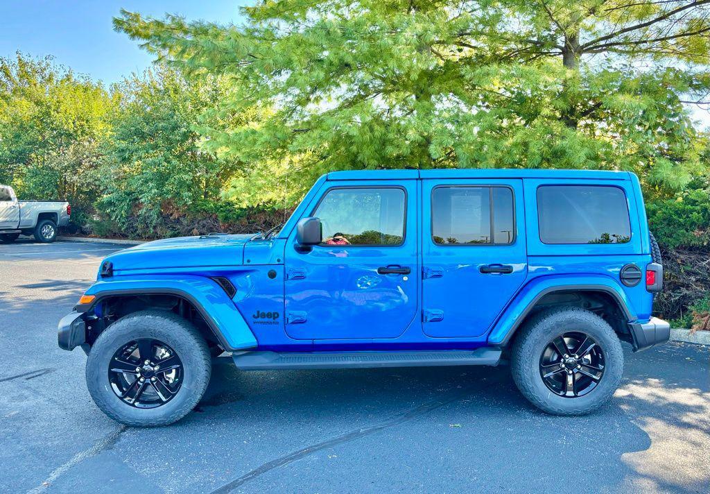 used 2021 Jeep Wrangler Unlimited car, priced at $33,255