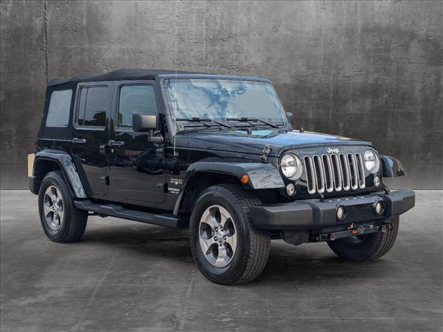 used 2016 Jeep Wrangler Unlimited car, priced at $22,596