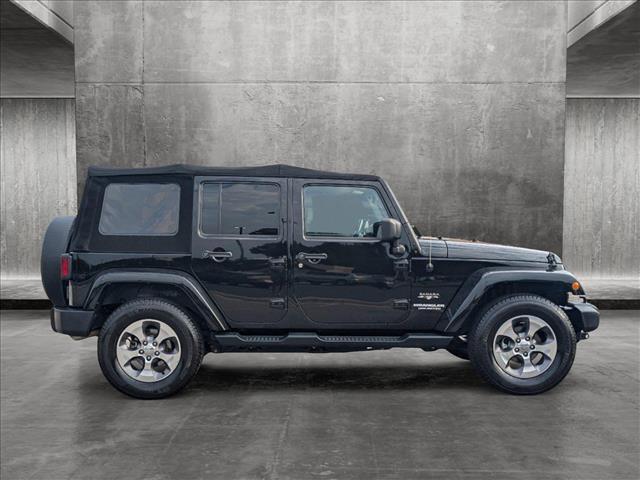 used 2016 Jeep Wrangler Unlimited car, priced at $22,596